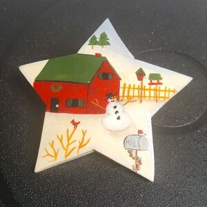 Handpainted wooden star brooch winter scene.